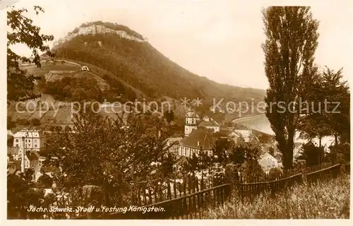 AK / Ansichtskarte  Koenigstein_Saechsische_Schweiz Ortsansicht mit Kirche Blick zur Festung Koenigstein Koenigstein_Saechsische