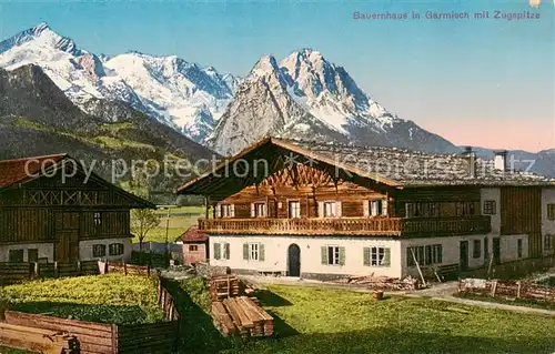 AK / Ansichtskarte 73811383 Garmisch-Partenkirchen Bauernhaus mit Zugspitze Garmisch-Partenkirchen