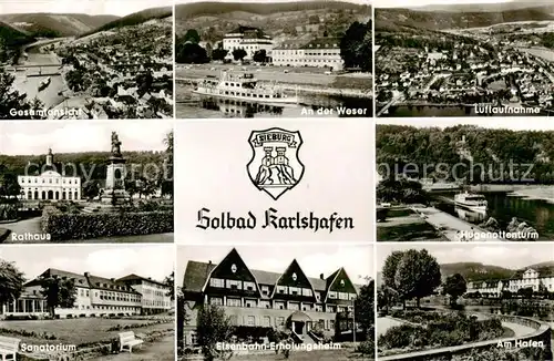 AK / Ansichtskarte  Bad_Karlshafen Panorama Weserpartie Fliegeraufnahme Rathaus Hugenottenturm Sanatorium Eisenbahn Erholungsheim Am Hafen Bad_Karlshafen