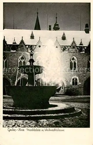 AK / Ansichtskarte  Goslar Marktplatz mit Weihnachtsbaum Brunnen Goslar