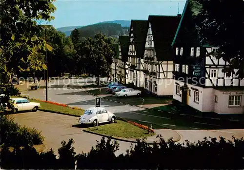 AK / Ansichtskarte  Hilchenbach Marktplatz mit Glockenspiel 