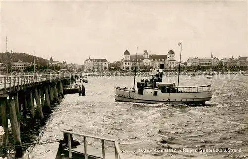 AK / Ansichtskarte  Binz_Ruegen Seebruecke und Strand Binz_Ruegen