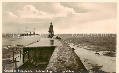 AK / Ansichtskarte 73818047 Swinemuende_Swinoujscie Ostmolenkopf mit Torpedoboot Kriegsschiff Swinemuende Swinoujscie
