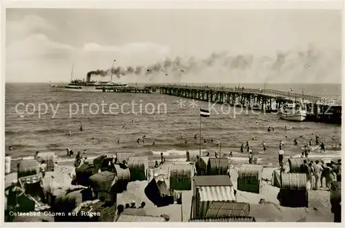 AK / Ansichtskarte  Goehren__Ostseebad_Ruegen Panorama Strand Bootssteg Dampfer 