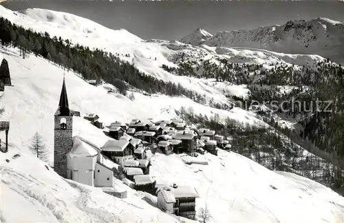 AK / Ansichtskarte Chandolin_Sierre_VS Bergdorf mit Kirche Blick gegen Tola Walliser Alpen im Winter 