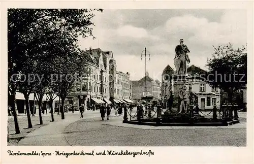 AK / Ansichtskarte  Fuerstenwalde_Spree Kriegerdenkmal und Muenchebergerstrasse Fuerstenwalde_Spree