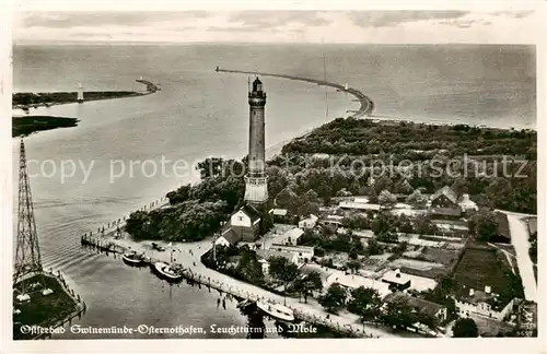 AK / Ansichtskarte  Osternothafen_Swinemuende Fliegeraufnahme mit Leuchtturm und Mole Osternothafen_Swinemuende