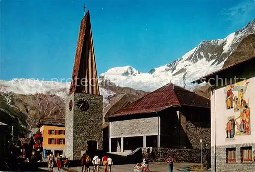 AK / Ansichtskarte Saas Fee_VS Kirche und Dorfplatz Alphubel Taeschhorn Walliser Alpen 