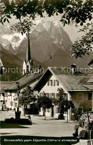 AK / Ansichtskarte 73828877 Waxensteine_3696m_Grainau Floriansplatz mit Zugspitze 