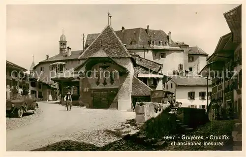 AK / Ansichtskarte Gruyeres__Gruyere_FR Crucifix et anciennes mesures 