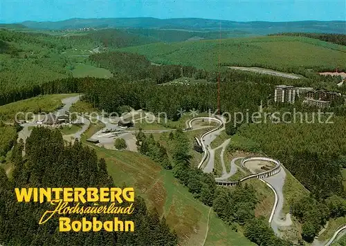 AK / Ansichtskarte Winterberg_Hochsauerland Bobbahn Fliegeraufnahme Winterberg_Hochsauerland