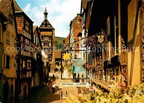 AK / Ansichtskarte Riquewihr_Haut_Rhin Rue principale Vielle Maison avec bais de Fenetre sculpte de lAncienne Hotellerie de l Etoile Riquewihr_Haut_Rhin