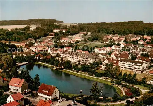 AK / Ansichtskarte  Bad_Meinberg Fliegeraufnahme mit Kurparksee Bad_Meinberg