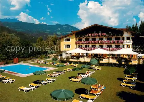 AK / Ansichtskarte 73837423 St_Johann_Pongau Hotel Berghof Rettenwender Liegewiese Pool St_Johann_Pongau