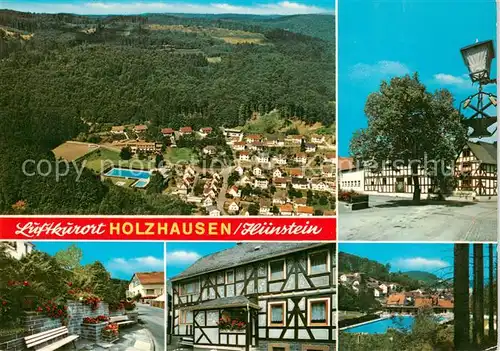 AK / Ansichtskarte Holzhausen_Huenstein Fliegeraufnahme Teilansichten Schwimmbad Holzhausen_Huenstein