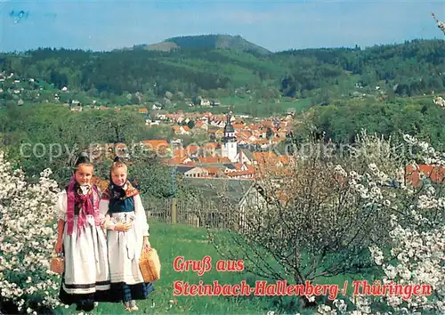 AK / Ansichtskarte  Steinbach_Hallenberg Panorama Blick zum Hermannsberg Trachten Baumbluete Steinbach_Hallenberg