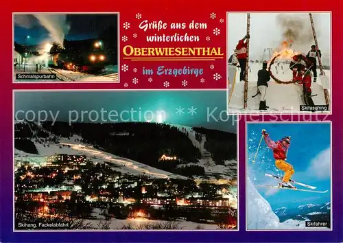 AK / Ansichtskarte 73840809 Oberwiesenthal_Erzgebirge Schmalspurspan Skihang Fackelabfahrt Skifaschine Skifahrer Nachtaufnahmen Oberwiesenthal Erzgebirge