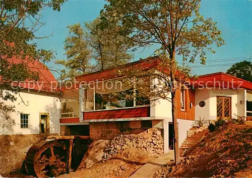 AK / Ansichtskarte Bad_Iburg Cafe Schlossmuehle Haupteingang mit Muehlrad Bad_Iburg