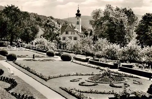 AK / Ansichtskarte  Bad_Brueckenau Anlage am Fuerstenhof mit Blick zur kath Kirche Bad_Brueckenau