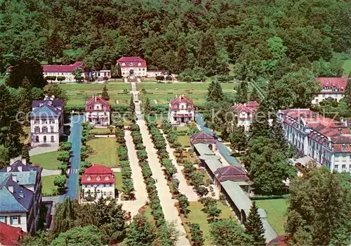 AK / Ansichtskarte  Bad_Brueckenau Kurgarten mit Fuerstenhof und Kurhotel Kurort im Naturpark Bayerische Rhoen Bad_Brueckenau