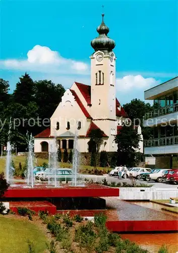 AK / Ansichtskarte  Bad_Brueckenau Am Kurmittelhaus Blick zur Marien Kirche Bad_Brueckenau