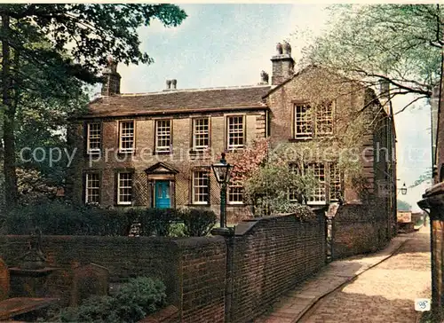 AK / Ansichtskarte 73847615 Haworth__Yorkshire_UK Bronte Parsonage Museum from the Lane 