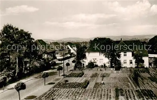 AK / Ansichtskarte 73849948 Loehne Koenigstrasse mit Blick auf das Wiehengebirge Loehne