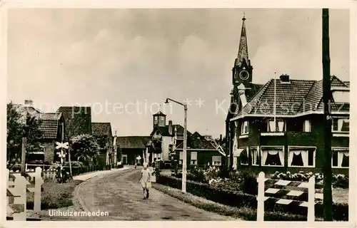 AK / Ansichtskarte  Uithuizermeeden_NL Ortspartie an der Kirche 