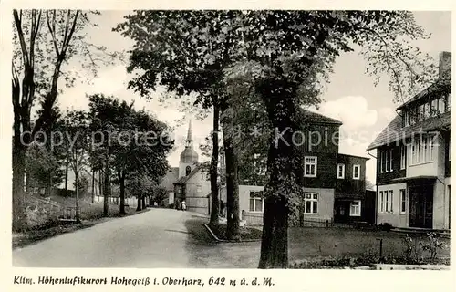 AK / Ansichtskarte 73850859 Hohegeiss_Harz Ortsmotiv mit Kirche Hoehenluftkurort Hohegeiss Harz