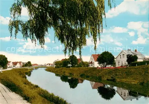 AK / Ansichtskarte 73851473 Carolinensiel_Ostfriesland Uferpartie am Kanal Carolinensiel