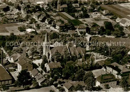 AK / Ansichtskarte  Laggenbeck_Ibbenbueren Ansicht mit Kirche Original-Luftfoto 