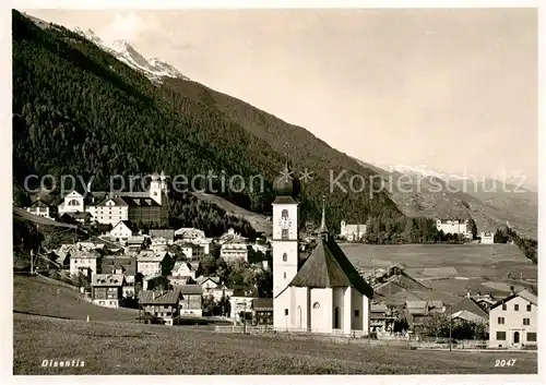 AK / Ansichtskarte  Disentis_GR Ortsansicht mit Kirche Disentis GR