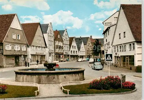 AK / Ansichtskarte  Steinheim_Westfalen Stadtpartie mit Brunnen Steinheim_Westfalen