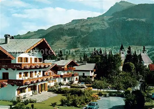 AK / Ansichtskarte 73856940 Kitzbuehel_Tirol_AT Blick zum Kitzbueheler Horn mit Haus Toni Sailer 