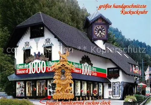 AK / Ansichtskarte 73859382 Gremmelsbach_Triberg Haus der 1000 Uhren Groesste handgeschnitzte Kuckucksuhr 