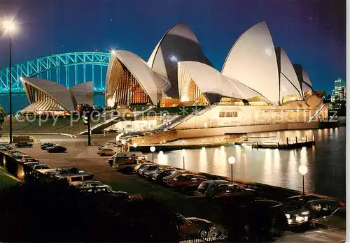 AK / Ansichtskarte Sydney__NSW_Australia The white sails on the Opera House floodlit at dusk 