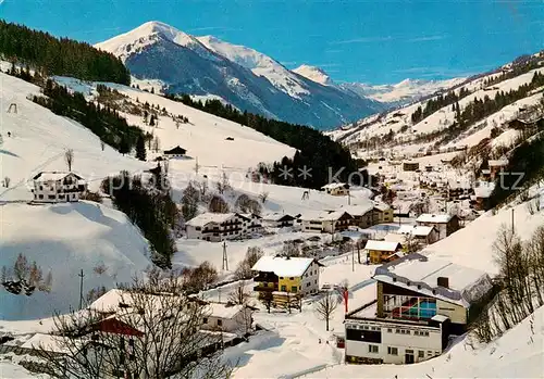 AK / Ansichtskarte  Saalbach_-Hinterglemm_AT Panorama mit Hallenbad und Zwoelferkogel 