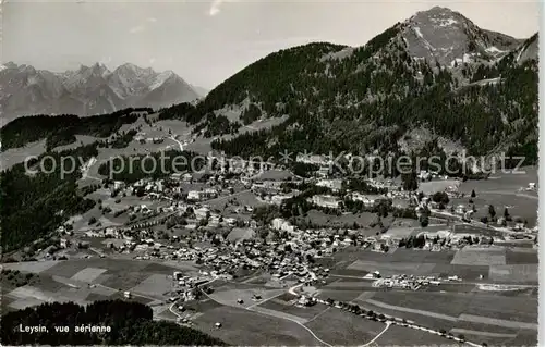 AK / Ansichtskarte  Leysin_VD et les Alpes vue aérienne 
