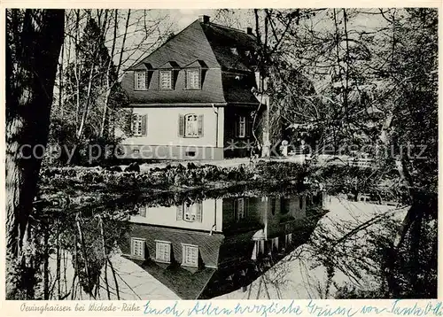AK / Ansichtskarte 73863230 Oeuinghausen Haus im Wald am Teich Wasserspiegelung 