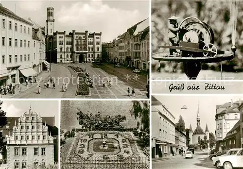 AK / Ansichtskarte  Zittau Platz der Jugend mit Rathaus Schleifermaennel am Gruenen Ring Heftergiebel am Stadtmuseum Blumenuhr HOG Volkshaus und Weberkirche Zittau