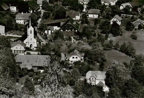 AK / Ansichtskarte 73863814 Tschoeran_Bodensdorf_Ossiacher_See_Kaernten_AT Ansicht mit Kirche 