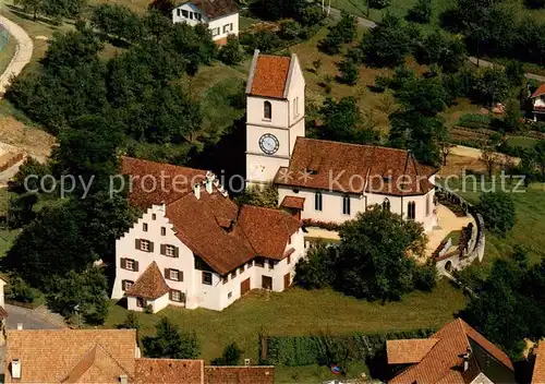 AK / Ansichtskarte  Oltingen_BL Reformierte Kirche St Nikolaus und Pfarrhaus Fliegeraufnahme 