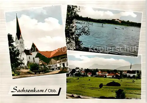 AK / Ansichtskarte 73865307 Sachsenkam Ortsmotiv mit Kirche Panorama Kirchsee mit Reutberg Sachsenkam