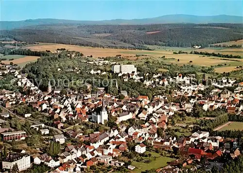 AK / Ansichtskarte  Bad_Camberg Kneipp-Kurort Teilansicht mit grossem Feldberg im Hintergrund Bad_Camberg