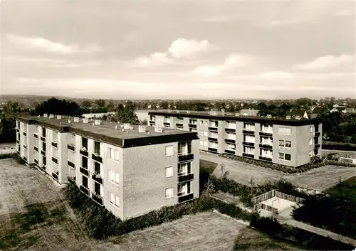 AK / Ansichtskarte 73868453 Thesdorf_Pinneberg Panorama Wohnblocks Verlagsstempel 