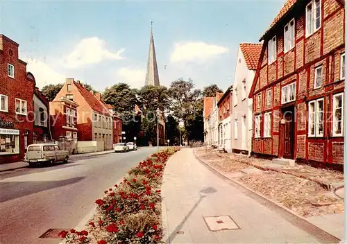 AK / Ansichtskarte  Travemuende_Ostseebad Kurgartenstrasse mit Blick zur Kirche Travemuende_Ostseebad