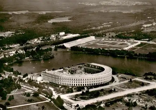 AK / Ansichtskarte  Nuernberg Ausstellungsrundbau am Dutzendteich mit der Anlage auf der Zeppelin Wiese Fliegeraufnahme Nuernberg