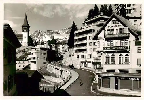 AK / Ansichtskarte  Arosa_GR Dorfmitte mit Hotel Schweizerhof Arosa_GR