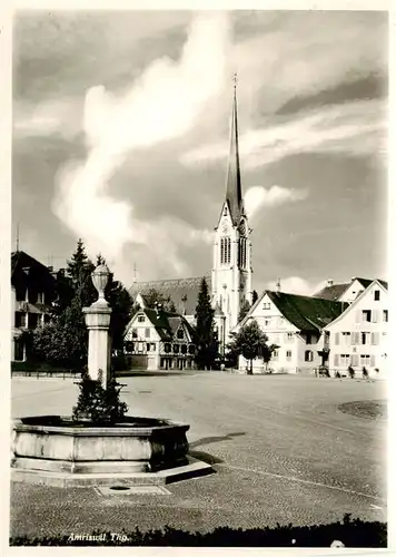 AK / Ansichtskarte  Amriswil_Amrisweil_TG Dorfplatz Brunnen Kirche 