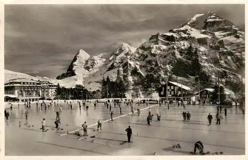 AK / Ansichtskarte  Muerren_BE Palace Eisbahn mit Eiger Moench und Jungfrau Muerren_BE